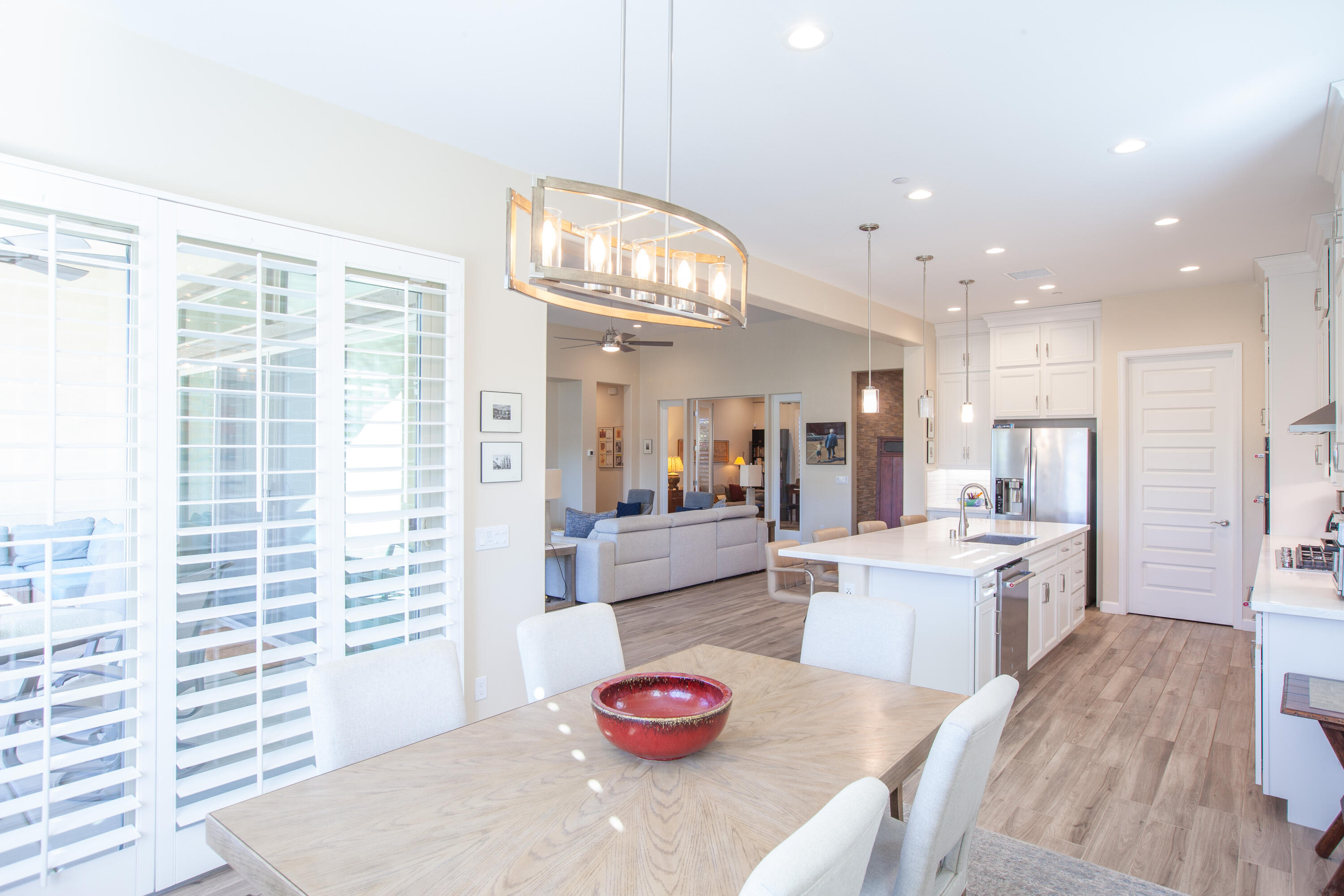 38 Burgundy Rancho Mirage, CA 92270 - Photo 6 of 20 a kitchen with a sink stove and wooden floor