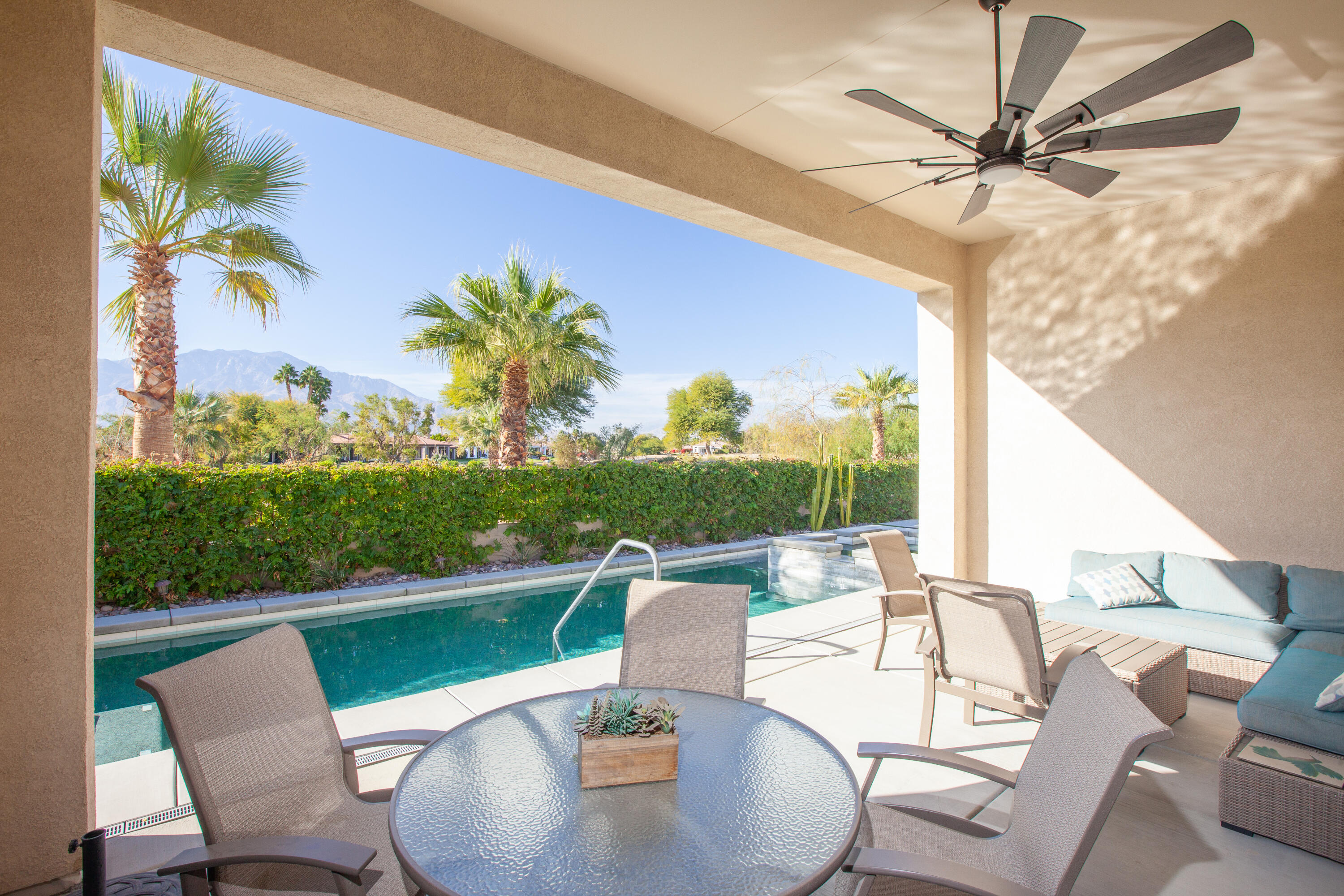 38 Burgundy Rancho Mirage, CA 92270 - Photo 7 of 20 a view of a patio with a table chairs and a table