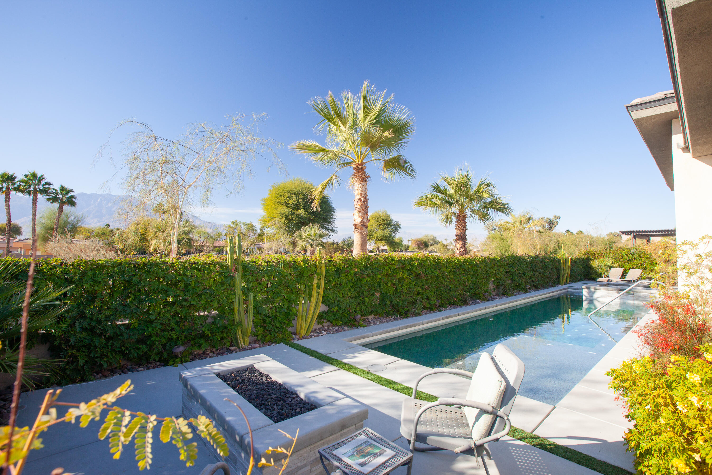 38 Burgundy Rancho Mirage, CA 92270 - Photo 8 of 20 a view of a swimming pool with a patio