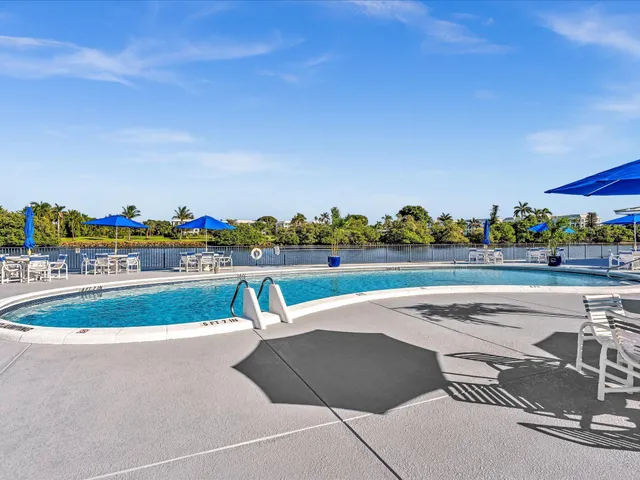 a view of a terrace with seating area and furniture