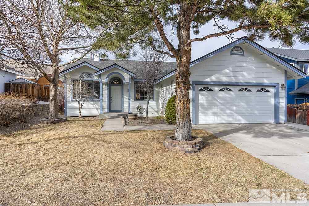 3943 Regal Drive Reno, NV 89503 - Photo 1 of 29 a front view of a house with a yard