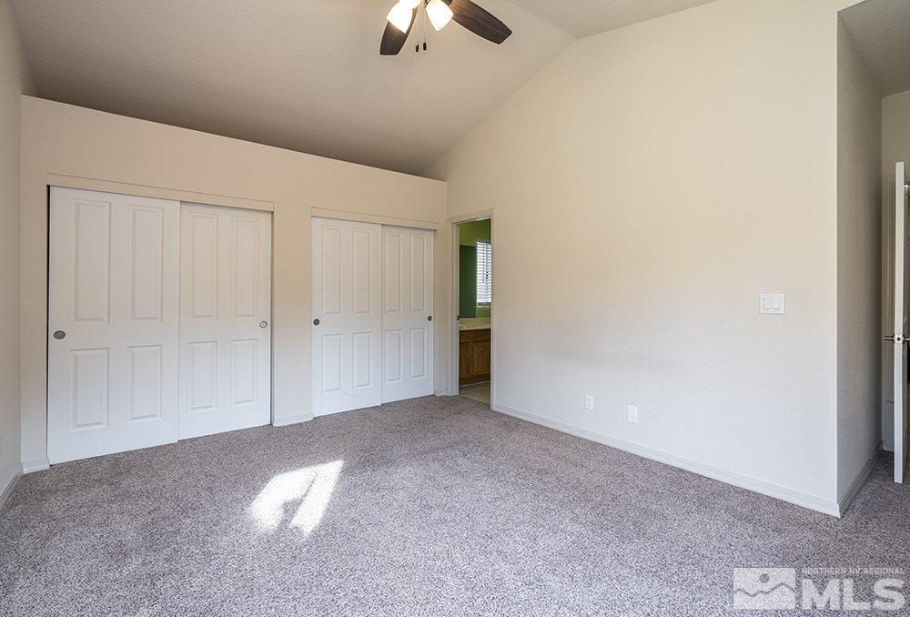 3943 Regal Drive Reno, NV 89503 - Photo 18 of 29 an empty room with chandelier fan