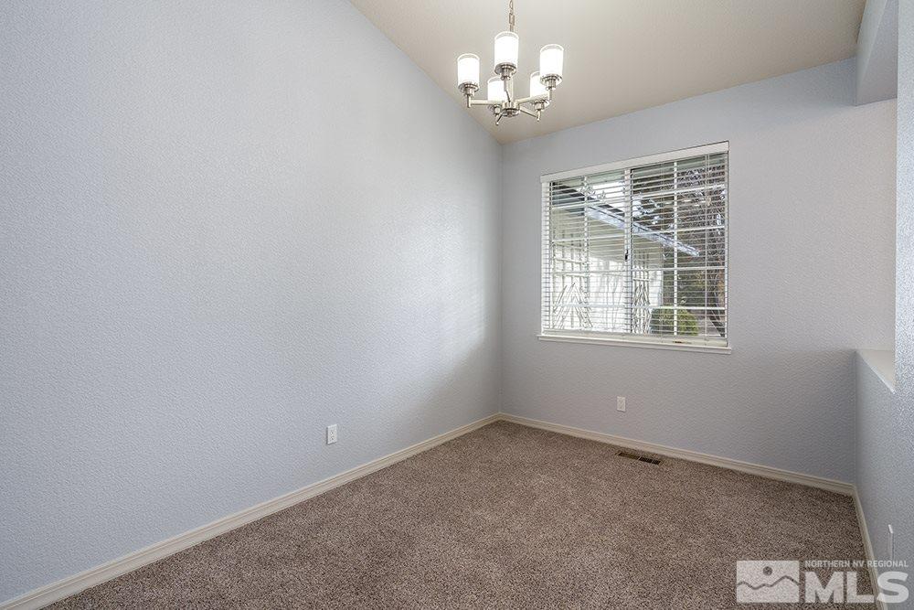 3943 Regal Drive Reno, NV 89503 - Photo 23 of 29 en empty room with windows