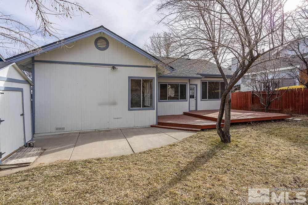 3943 Regal Drive Reno, NV 89503 - Photo 25 of 29 a house with trees in the background