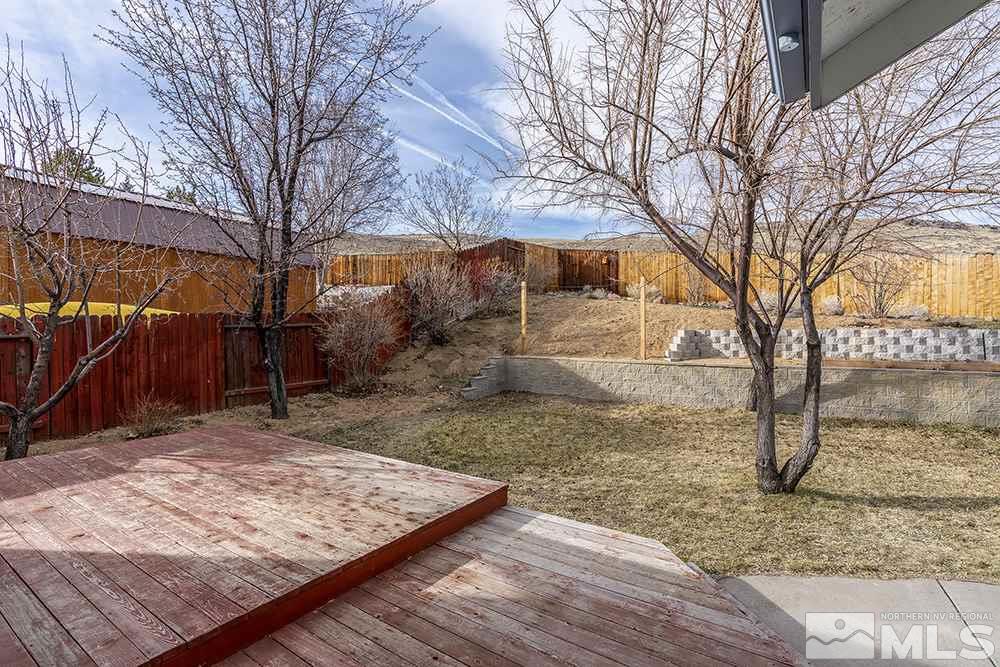 3943 Regal Drive Reno, NV 89503 - Photo 27 of 29 a view of a yard with a tree
