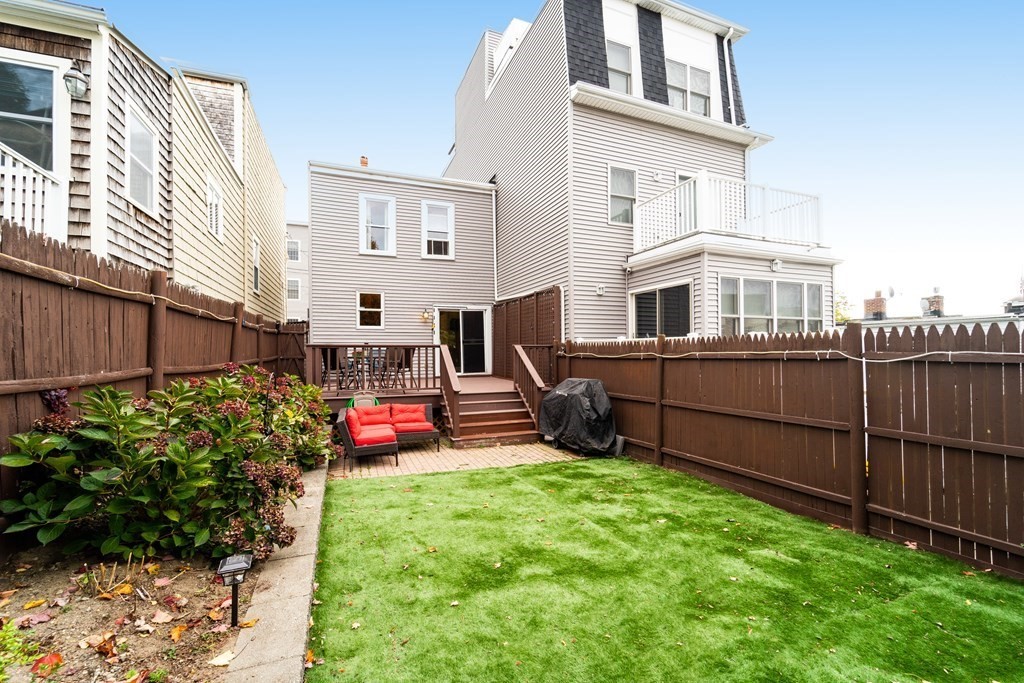 32 Covington Street, Unit SF Boston, MA 02127 - Photo 1 of 27 a house view with a garden space