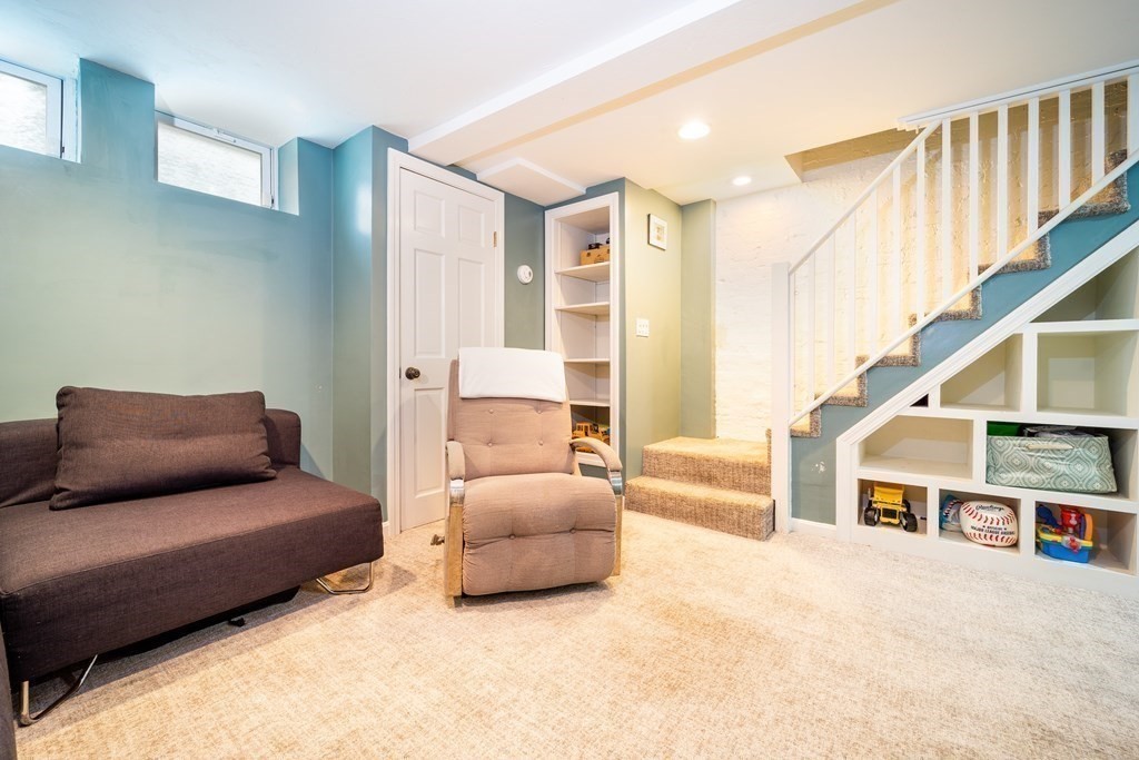 32 Covington Street, Unit SF Boston, MA 02127 - Photo 19 of 27 a living room with furniture and a large window