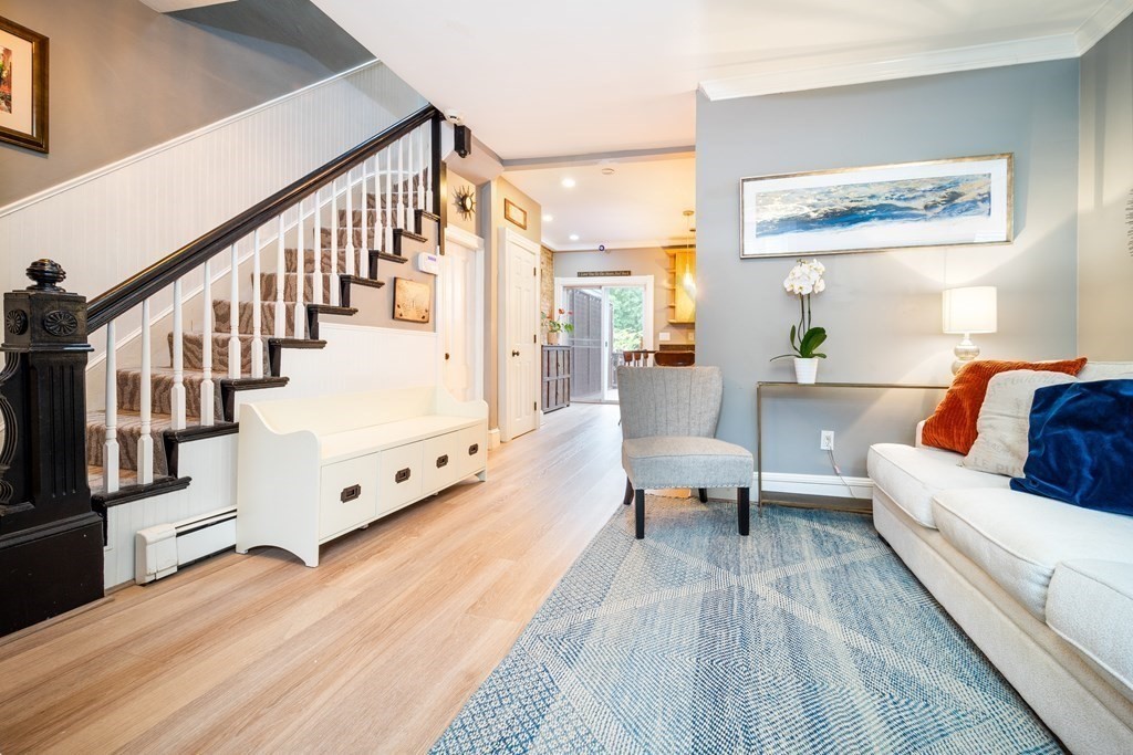 32 Covington Street, Unit SF Boston, MA 02127 - Photo 2 of 27 a living room with furniture and wooden floor
