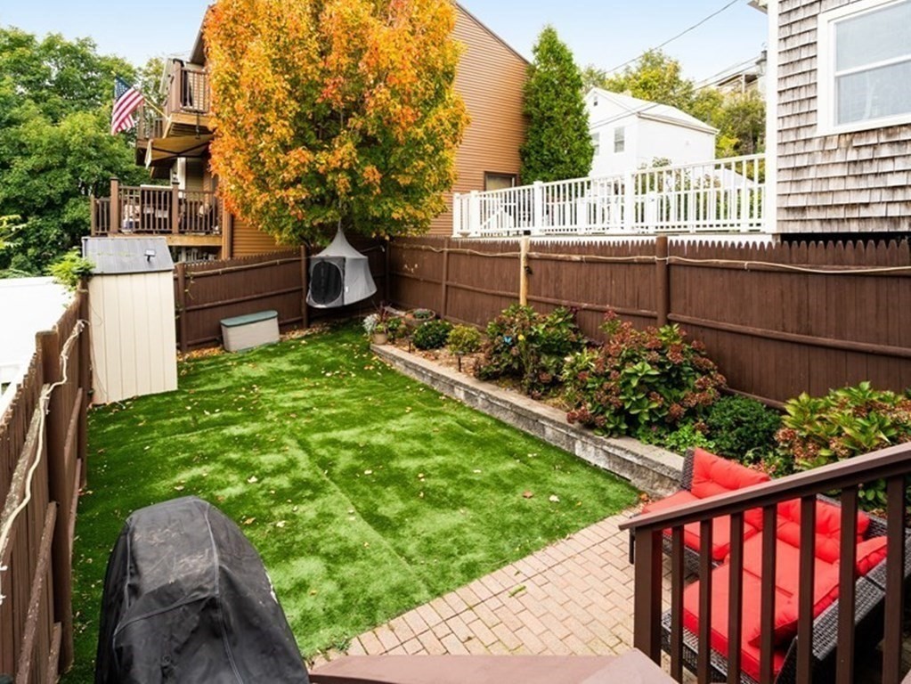 32 Covington Street, Unit SF Boston, MA 02127 - Photo 27 of 27 a view of a garden and iron fence