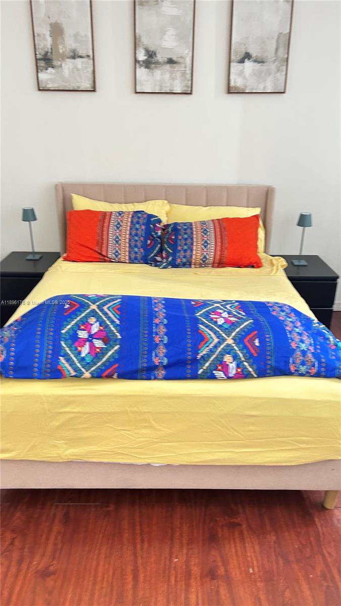 825 Brickell Bay Drive, Unit 443 Miami, FL 33131 - Photo 25 of 26 a view of wooden floor