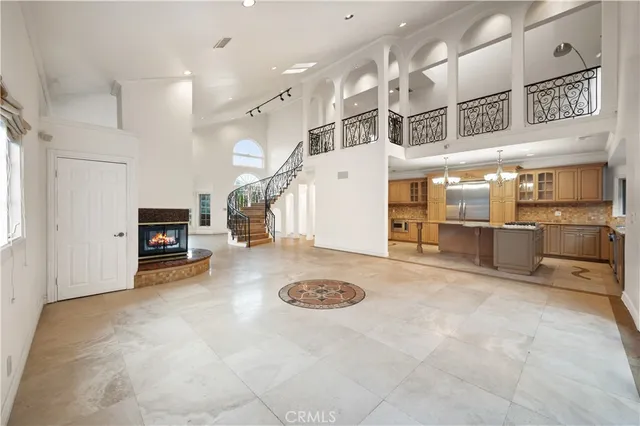 a view of a kitchen with furniture and a kitchen