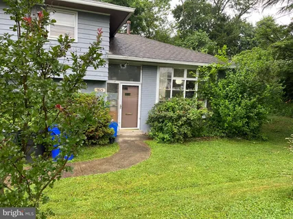 a house view with a garden space