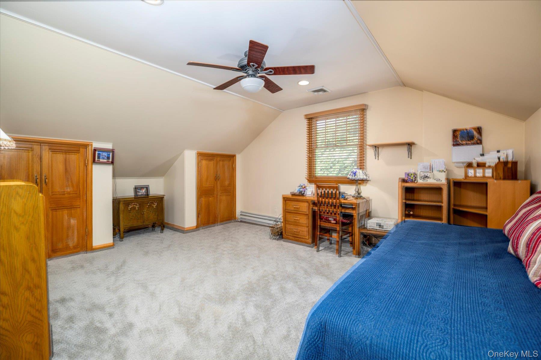 15 Baylis Road Rockville Centre, NY 11570 - Photo 11 of 20 a living room with furniture and kitchen view