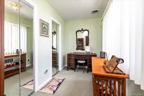 a view of a livingroom with furniture