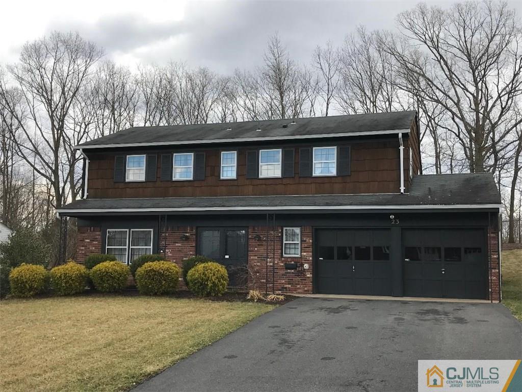 23 Layne Road Somerset, NJ 08873 - Photo 1 of 1 a front view of a house with yard