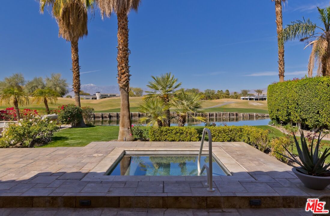 380 Loch Lomond Road Rancho Mirage, CA 92270 - Photo 14 of 39 a view of a yard with plants