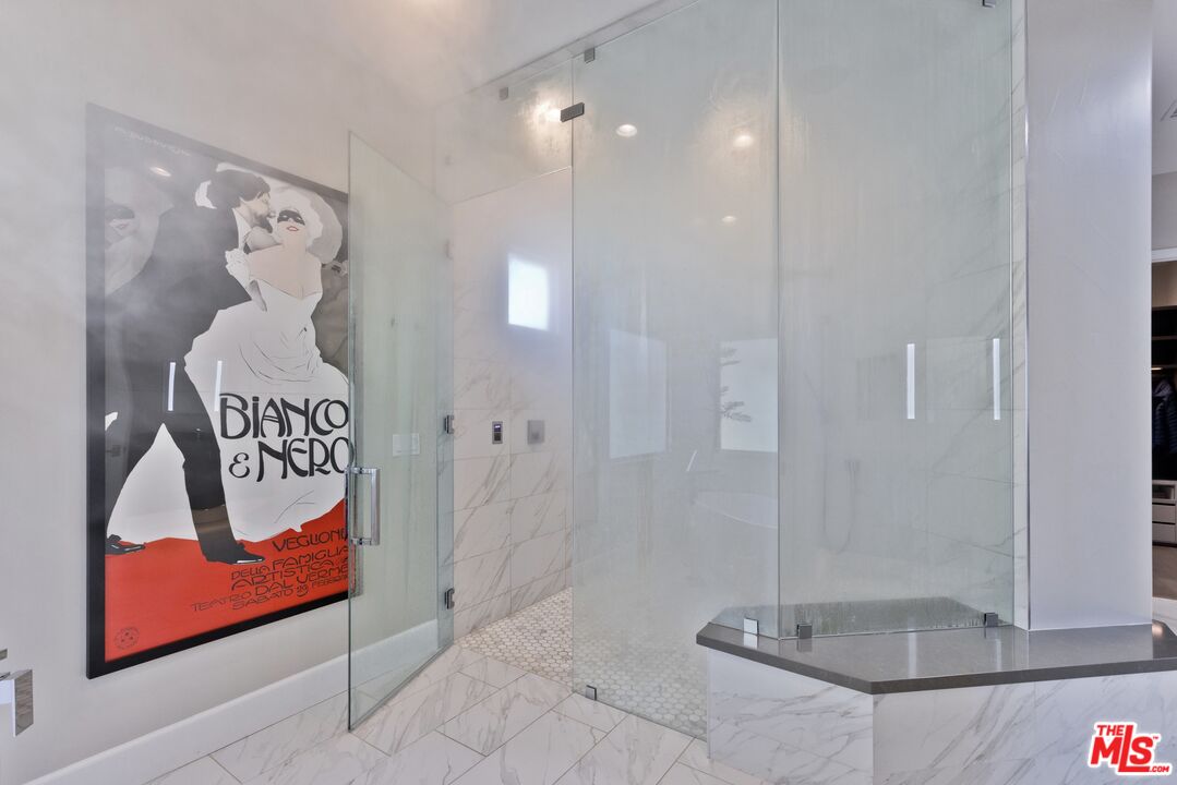 380 Loch Lomond Road Rancho Mirage, CA 92270 - Photo 18 of 39 a bathroom with a shower