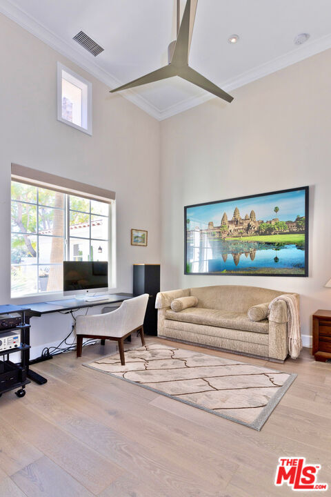380 Loch Lomond Road Rancho Mirage, CA 92270 - Photo 20 of 39 a living room with furniture and a flat screen tv