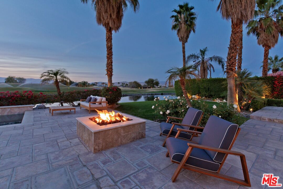 380 Loch Lomond Road Rancho Mirage, CA 92270 - Photo 29 of 39 a view of a chairs and tables in the patio