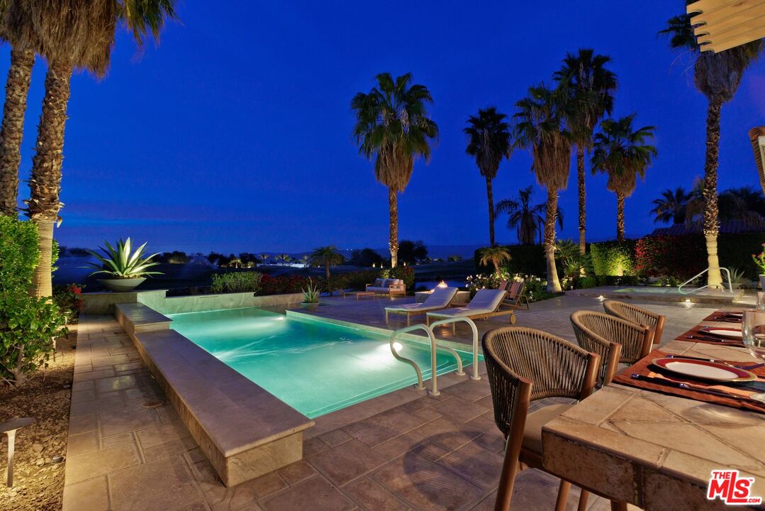 380 Loch Lomond Road Rancho Mirage, CA 92270 - Photo 31 of 39 a view of swimming pool with outdoor seating