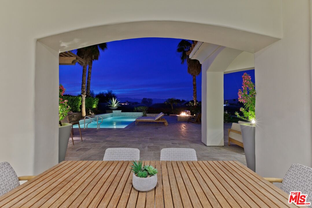 380 Loch Lomond Road Rancho Mirage, CA 92270 - Photo 33 of 39 a view of a house with a patio