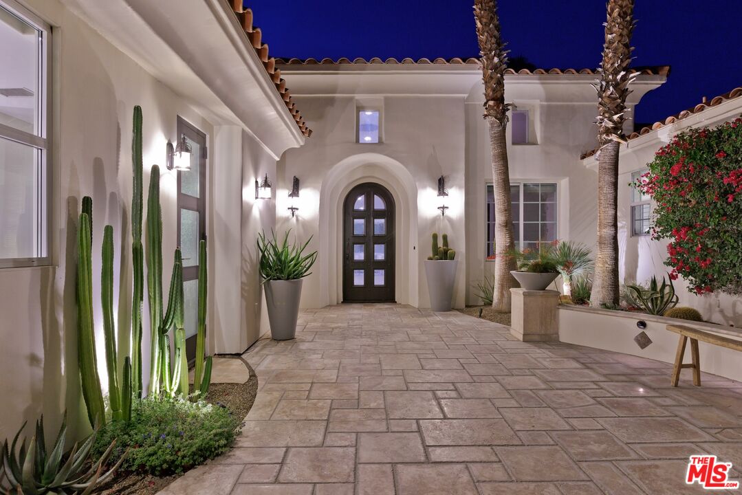 380 Loch Lomond Road Rancho Mirage, CA 92270 - Photo 34 of 39 a front view of a house