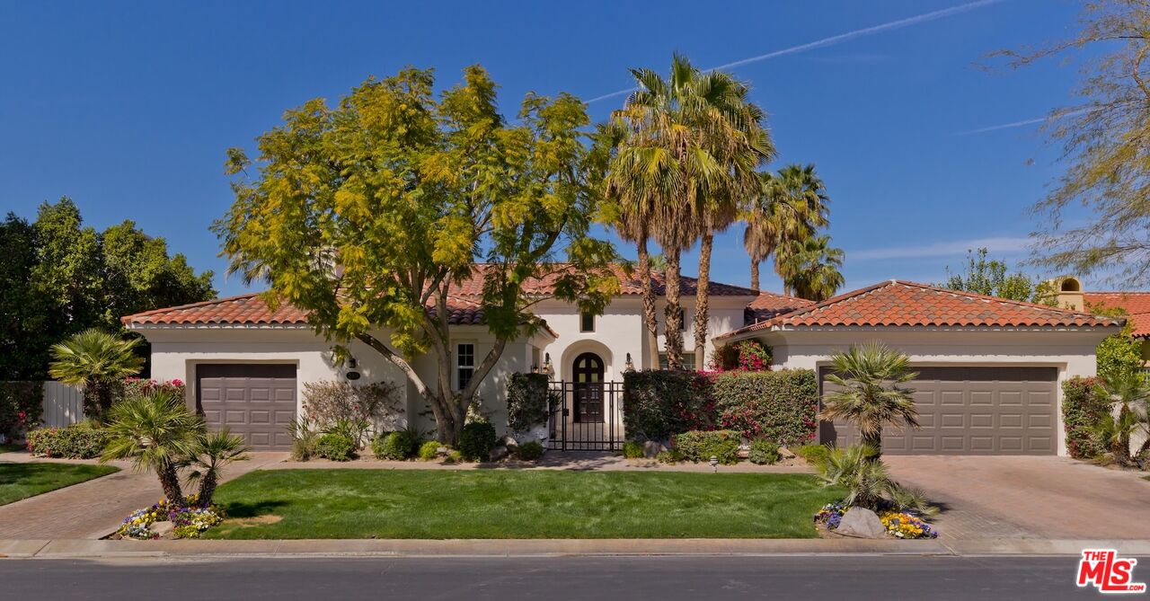 380 Loch Lomond Road Rancho Mirage, CA 92270 - Photo 37 of 39 a front view of a house with garden