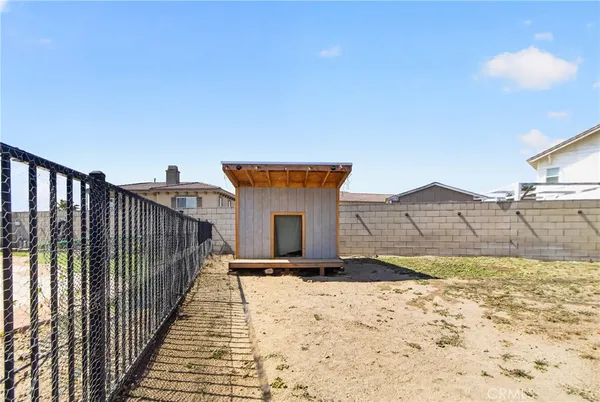 a view of a backyard of a house