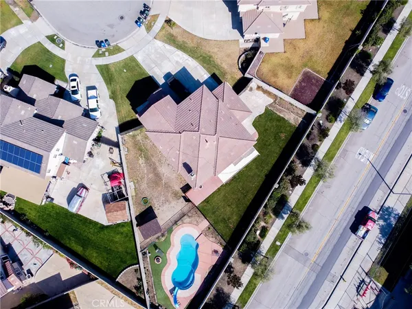 an aerial view of a house with a garden