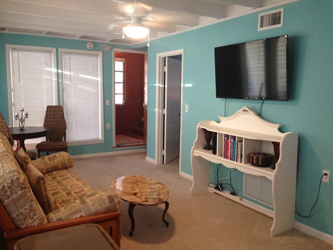 53 Barry Avenue Summerland Key, FL 33042 - Photo 12 of 22 a living room with furniture and a flat screen tv