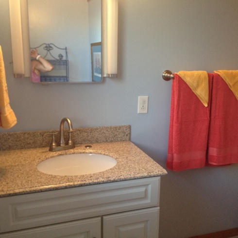 53 Barry Avenue Summerland Key, FL 33042 - Photo 19 of 22 a bathroom with a sink and a mirror
