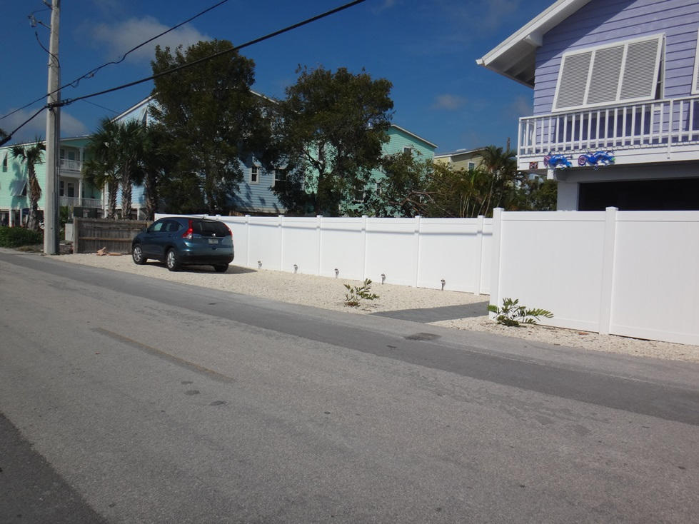 53 Barry Avenue Summerland Key, FL 33042 - Photo 21 of 22 a view of street with parked cars