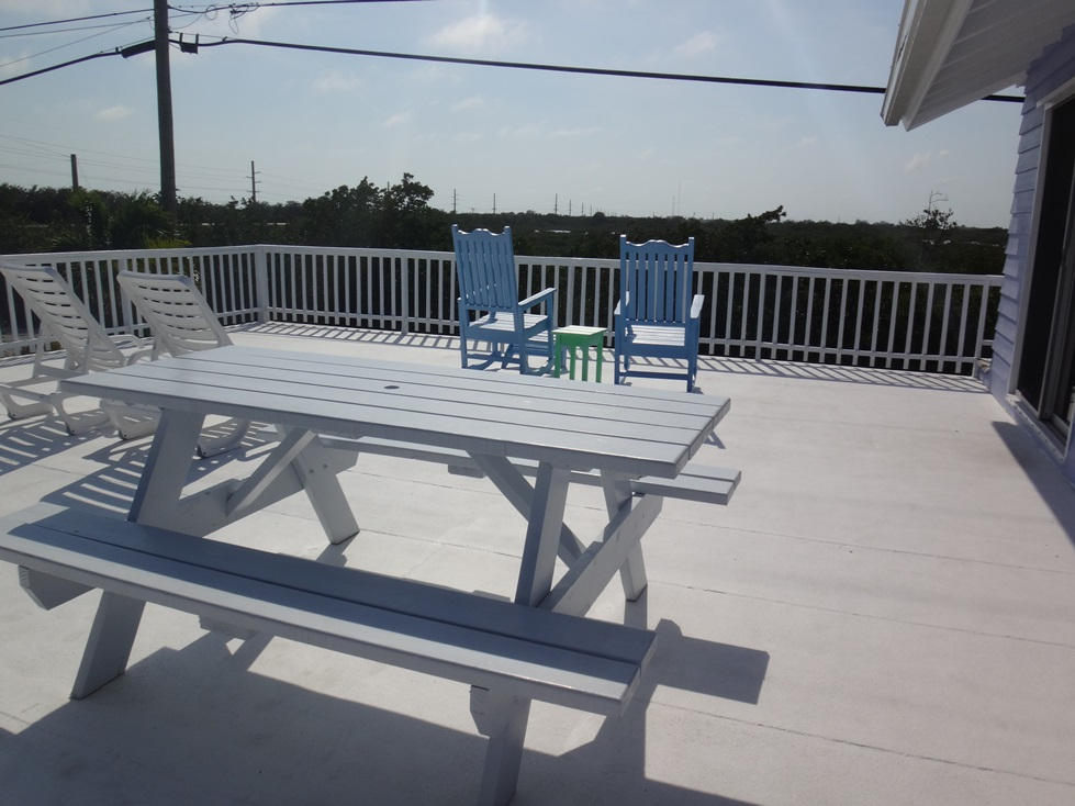 53 Barry Avenue Summerland Key, FL 33042 - Photo 5 of 22 a view of balcony with furniture