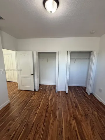 a view of a hallway with staircase