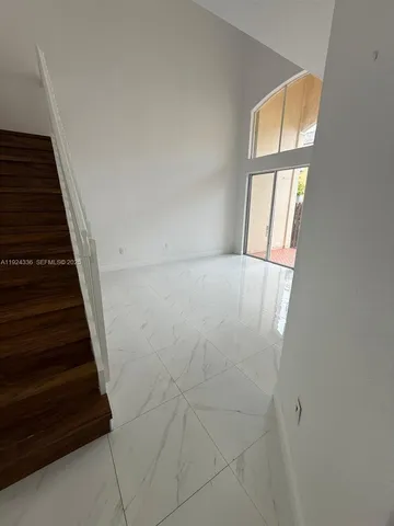 a view of an entryway with staircase