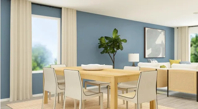 a kitchen with stainless steel appliances kitchen island granite countertop a refrigerator a sink dishwasher and white cabinets with wooden floor