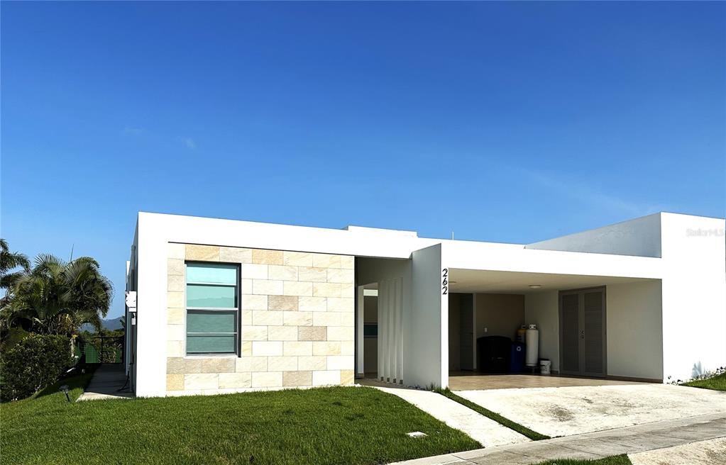 262 4th Gurabo, Gurabo 00778 - Photo 1 of 1 a view of a house with a backyard