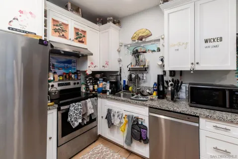 a room with furniture and a flat screen tv