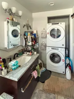 a view of a backyard with sitting area