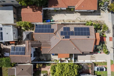 an aerial view of a city with lots of residential buildings
