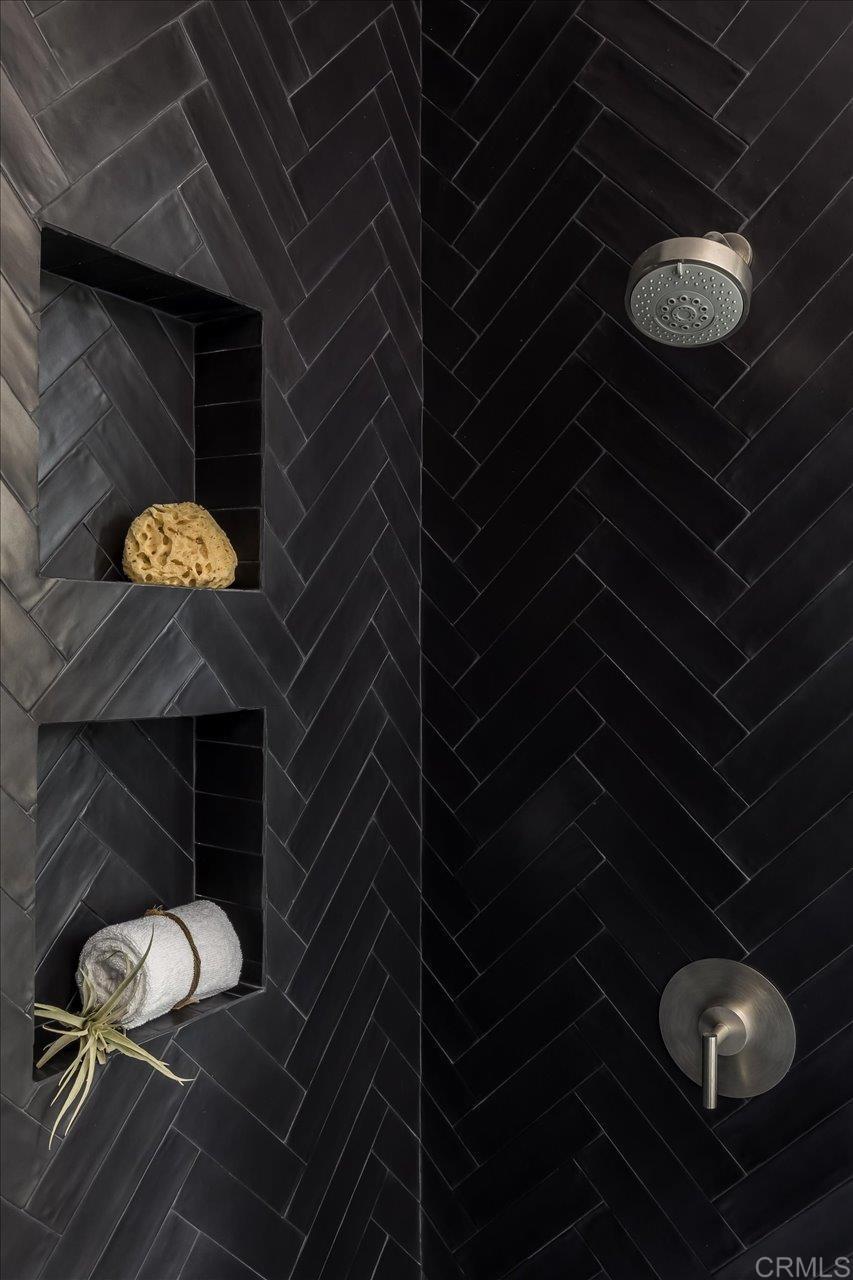 2920 Lone Jack Road Encinitas, CA 92024 - Photo 18 of 23 a bathroom with a sink and a mirror