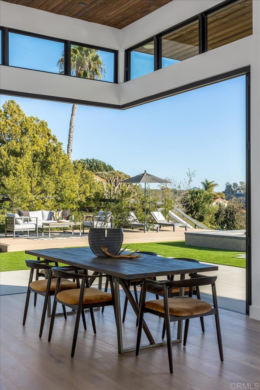 2920 Lone Jack Road Encinitas, CA 92024 - Photo 7 of 23 a view of a chairs and table in a balcony