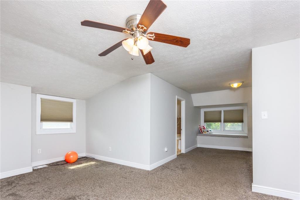 2114 Hampton Street Pittsburgh, PA 15218 - Photo 14 of 28 a living room with furniture and a ceiling fan