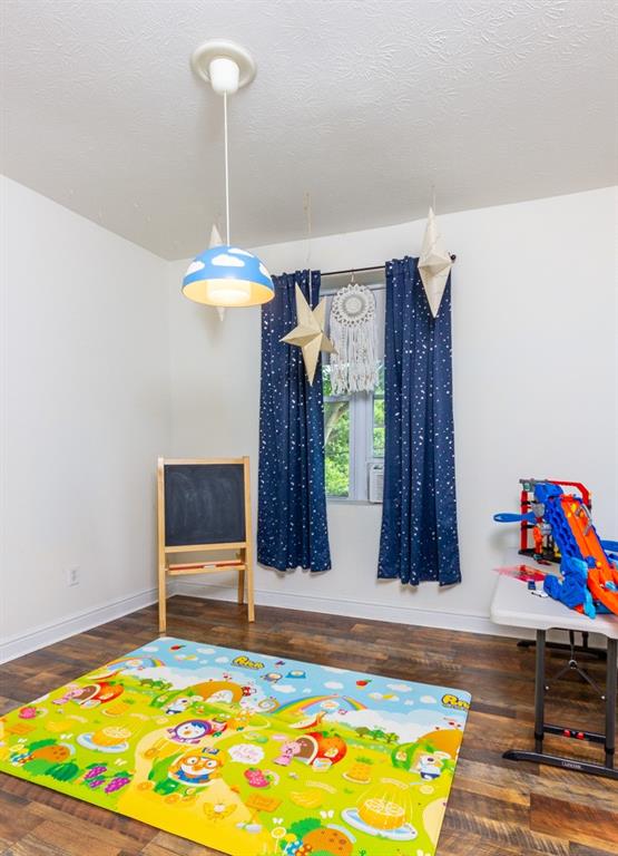 2114 Hampton Street Pittsburgh, PA 15218 - Photo 22 of 28 a living room with a bed and a table