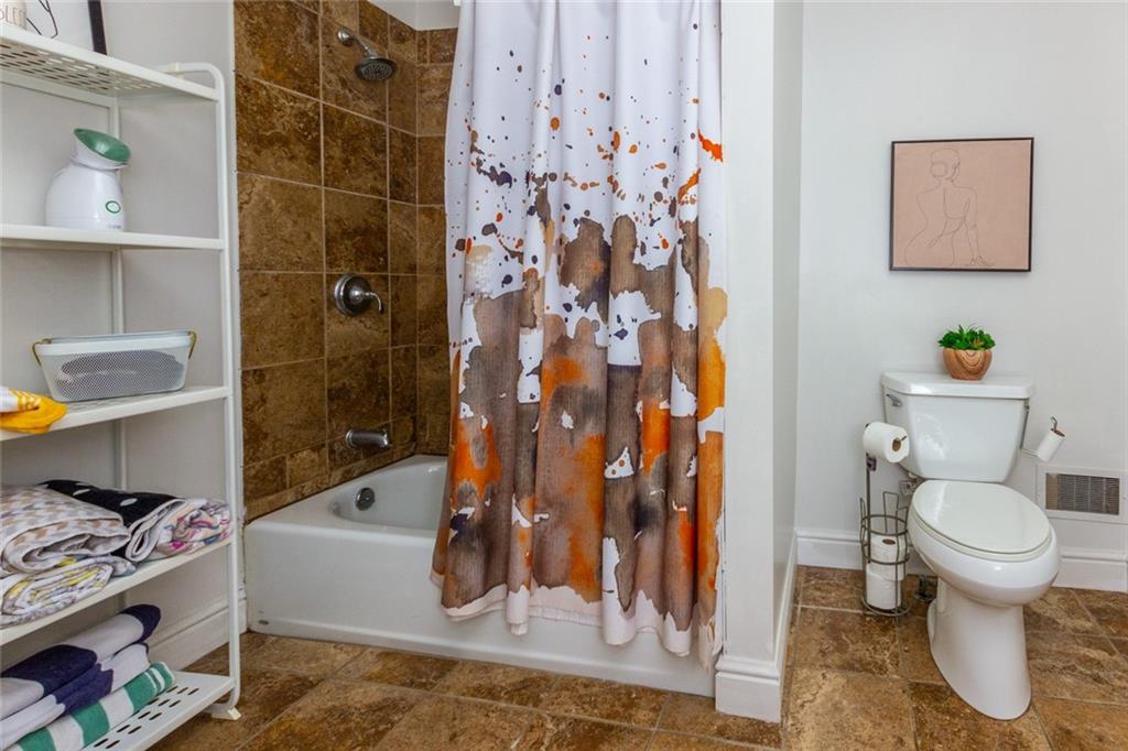 2114 Hampton Street Pittsburgh, PA 15218 - Photo 25 of 28 a bathroom with a toilet and a shower