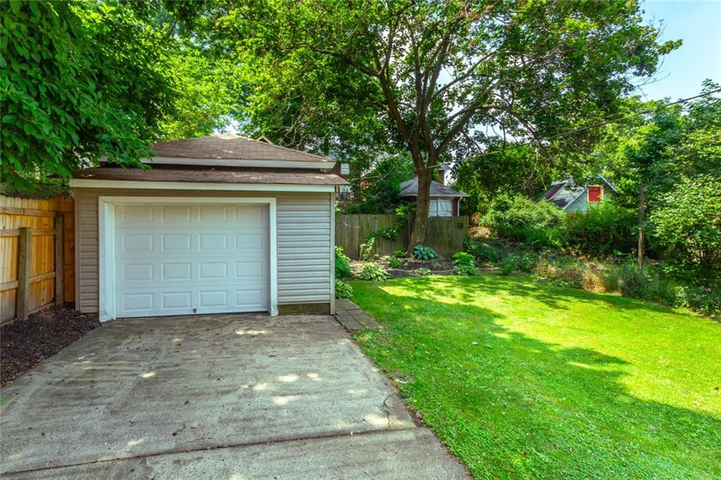 2114 Hampton Street Pittsburgh, PA 15218 - Photo 27 of 28 a front view of a house with garden