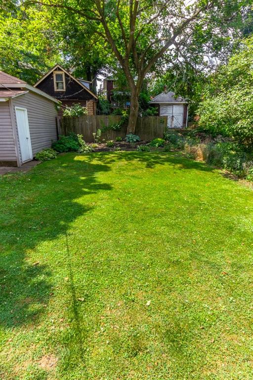 2114 Hampton Street Pittsburgh, PA 15218 - Photo 28 of 28 a backyard of a house with table and chairs
