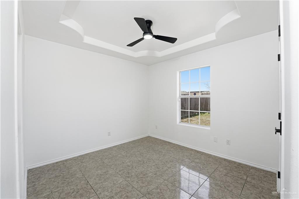 710 Sherryl Avenue Pharr, TX 78577 - Photo 12 of 13 a view of empty room with ceiling fan