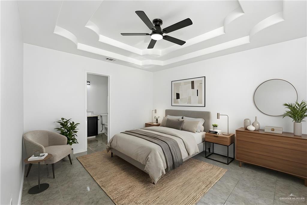 710 Sherryl Avenue Pharr, TX 78577 - Photo 6 of 13 a bedroom with bed and a chandelier