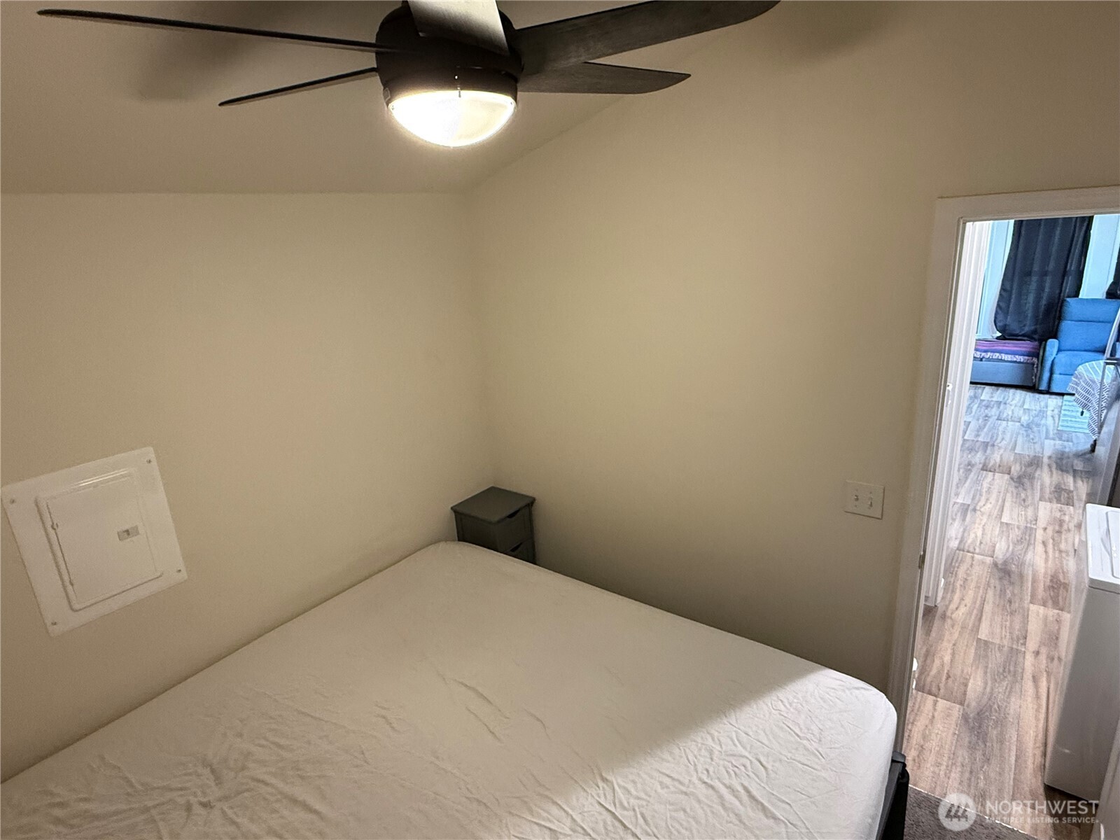 31465 Moore Road Northeast, Unit 801 Coulee City, WA 99115 - Photo 19 of 38 a bedroom with a bed and a chandelier